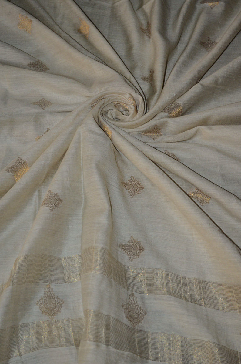 100% Pure Super Soft Muga Tussar Handloom with small Woven Butti Silk Dupatta ( This dupatta is a pure silk handloom product in its natural muga color can be dyed on prior request) For dyeing information please call us at 9930655009