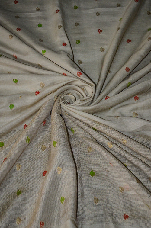 100% Pure Super Soft Muga Tussar Handloom Silk Dupatta, with small woven hand painted with natural dyes butti and border. ( THIS DUPATTA IS IN ITS NATURAL MUGA COLOR CAN BE DYED ON PRIOR REQUEST) FOR DYEING INFORMATION PLEASE CALL US AT 9930655009